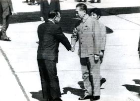 Prime Minister Kakuei Tanaka is greeted by Premier Zhou Enlai at the airport in Beijing.